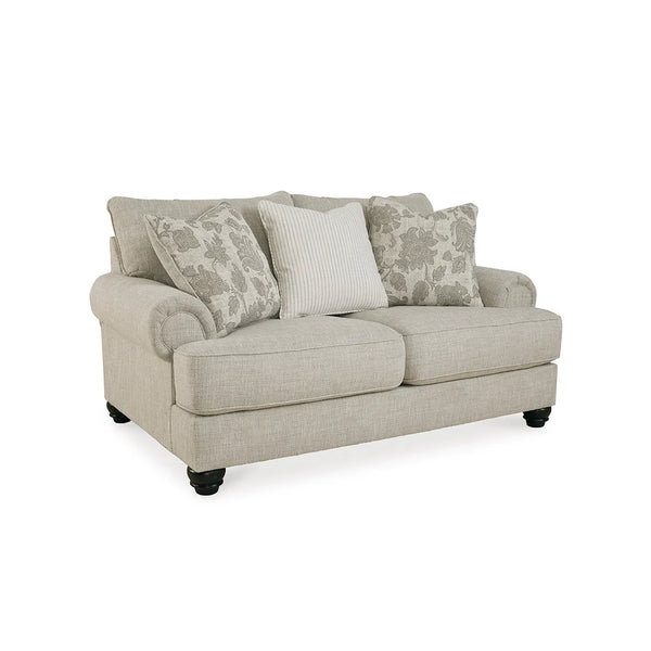 Modern loveseat featuring feather-blend accent pillows.