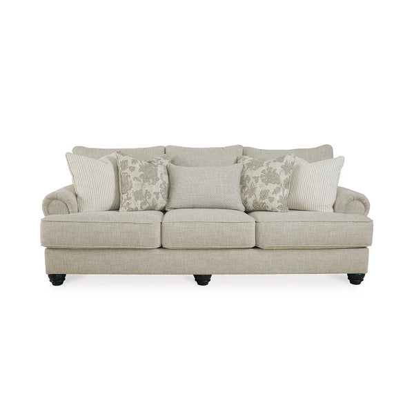 Elegant sofa with accent pillows filled with feather blend and polyester upholstery.