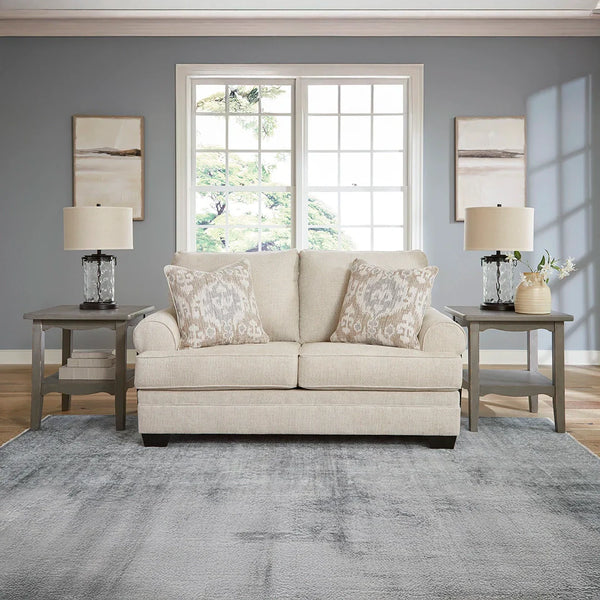 Classic loveseat with soft chenille upholstery and roll arms.