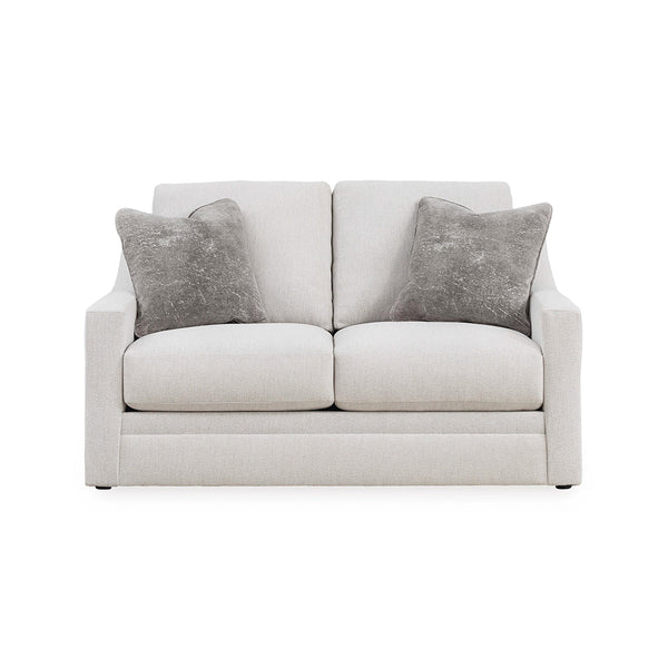Loveseat featuring reversible seat and back cushions with poly fiber wrap.
