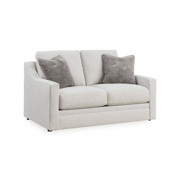 Maitelynn loveseat in soft polyester upholstery with accent pillows included.