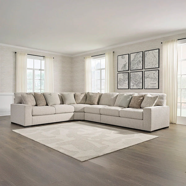 Contemporary sectional with feather-blend cushions and accent pillows