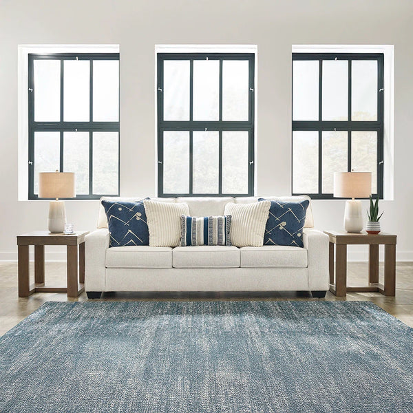 Padova neutral sofa with three-over-three design and reversible cushions – Ashley UAE.