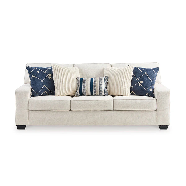Contemporary sofa with light upholstery and accent pillows – Ashley UAE.