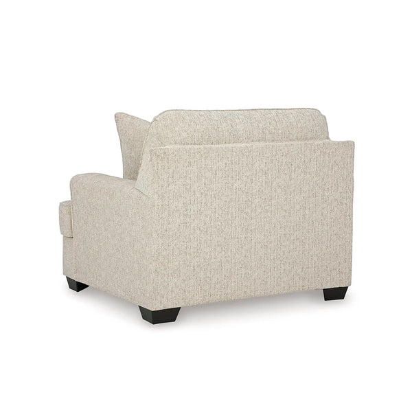Neutral oversized chair styled for modern living room comfort and elegance