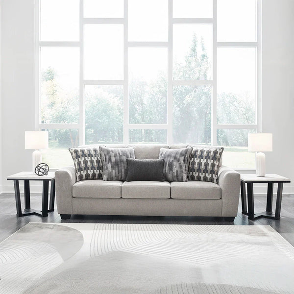 Ashley UAE sofa with textured upholstery and accent pillows.
