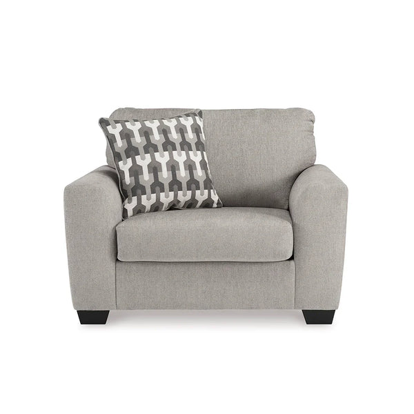 Chair with attached back cushions and loose seat cushions