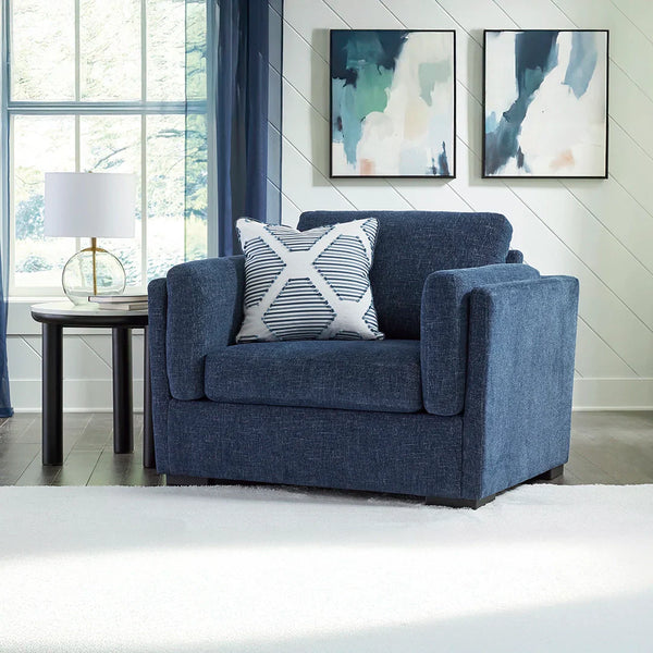 Oversized navy chair with reversible cushions and casual contemporary style
