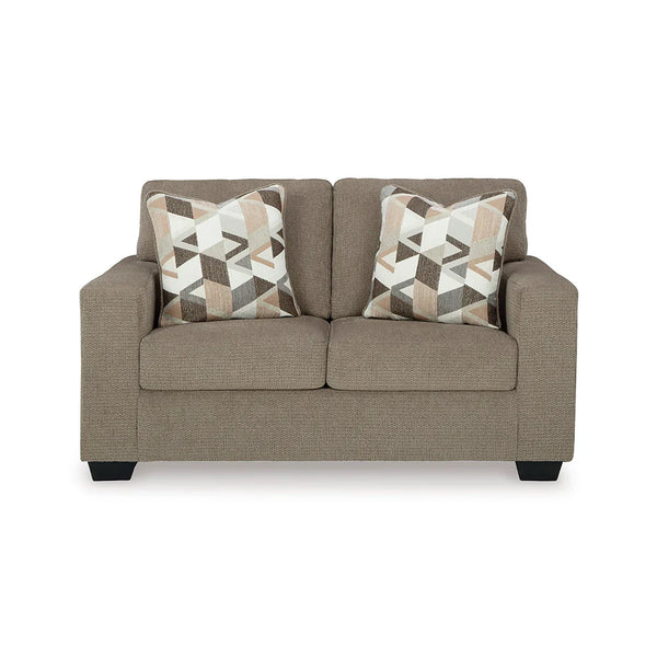 Loveseat featuring loose seat cushions and high-quality foam wrapped in poly fiber.