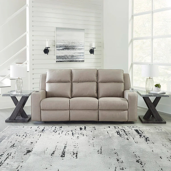 Large upholstered three-seater recliner sofa Dubai with tufted back cushions.