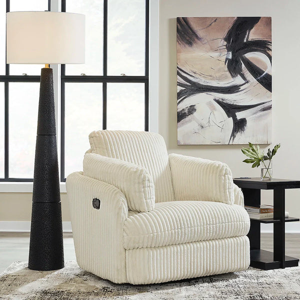 Barrel-shaped recliner with cord upholstery, swivel base, and hidden storage – Ashley UAE