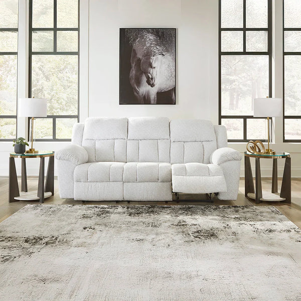 White corner recliner sofa and loveseat featuring plush cushions and style.