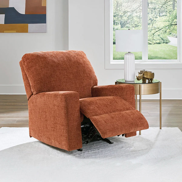 Burnt orange rocker recliner with pull tab reclining and plush cushions – Ashley UAE